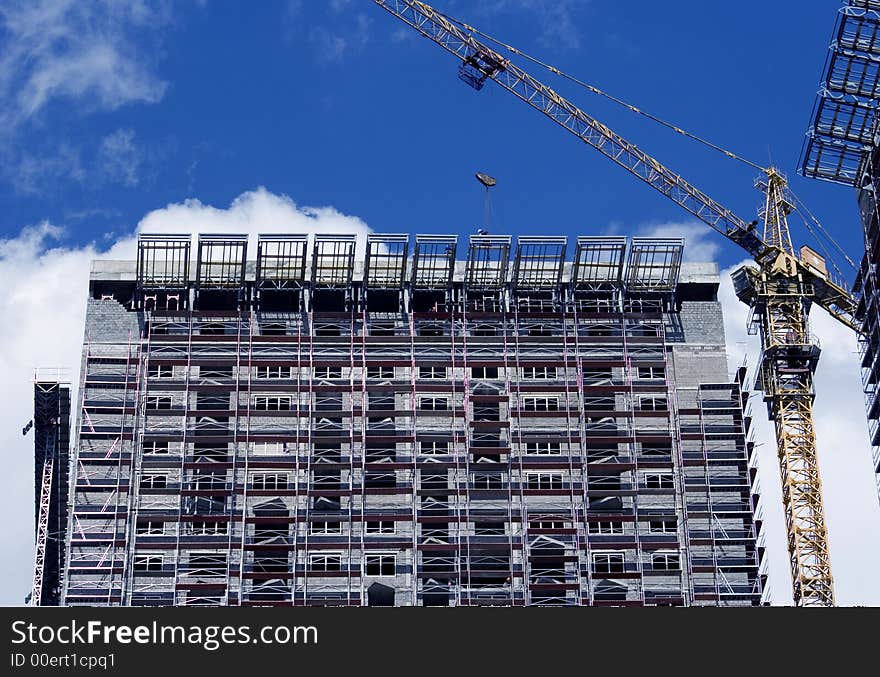 Modern building on the blue sky. Modern building on the blue sky