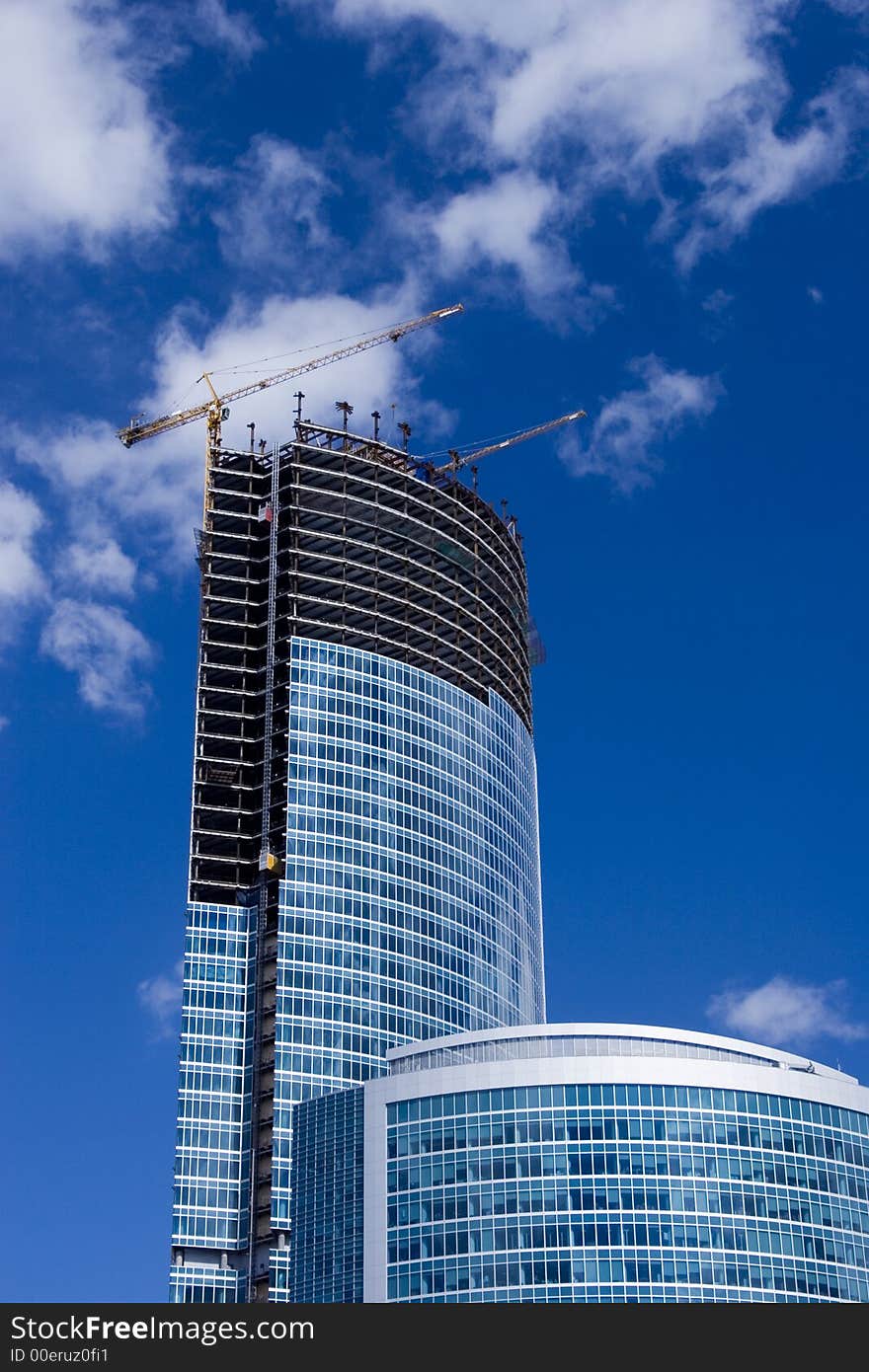 Modern building used for commercial purposes on the blue sky. Modern building used for commercial purposes on the blue sky