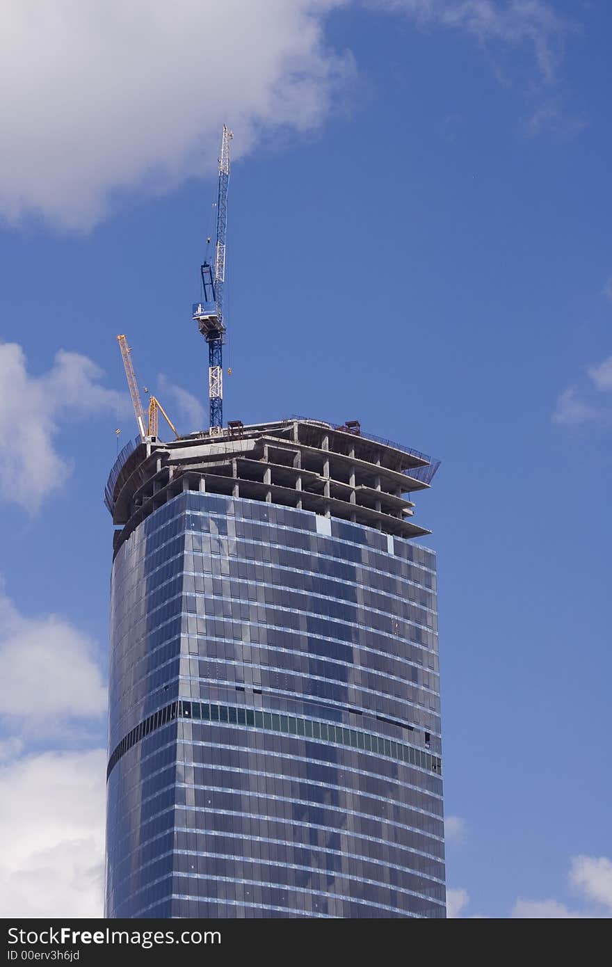 Modern building used for commercial purposes on the blue sky. Modern building used for commercial purposes on the blue sky