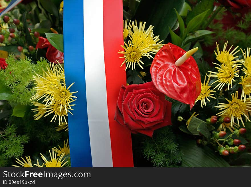 Ribbon from French flag and bouquet. Ribbon from French flag and bouquet