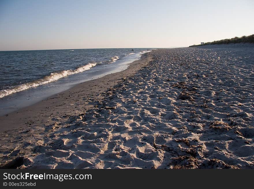 Coastline with surf at baltic sea, germany