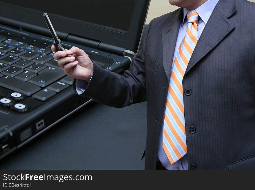 Businessman testing a connection in the office