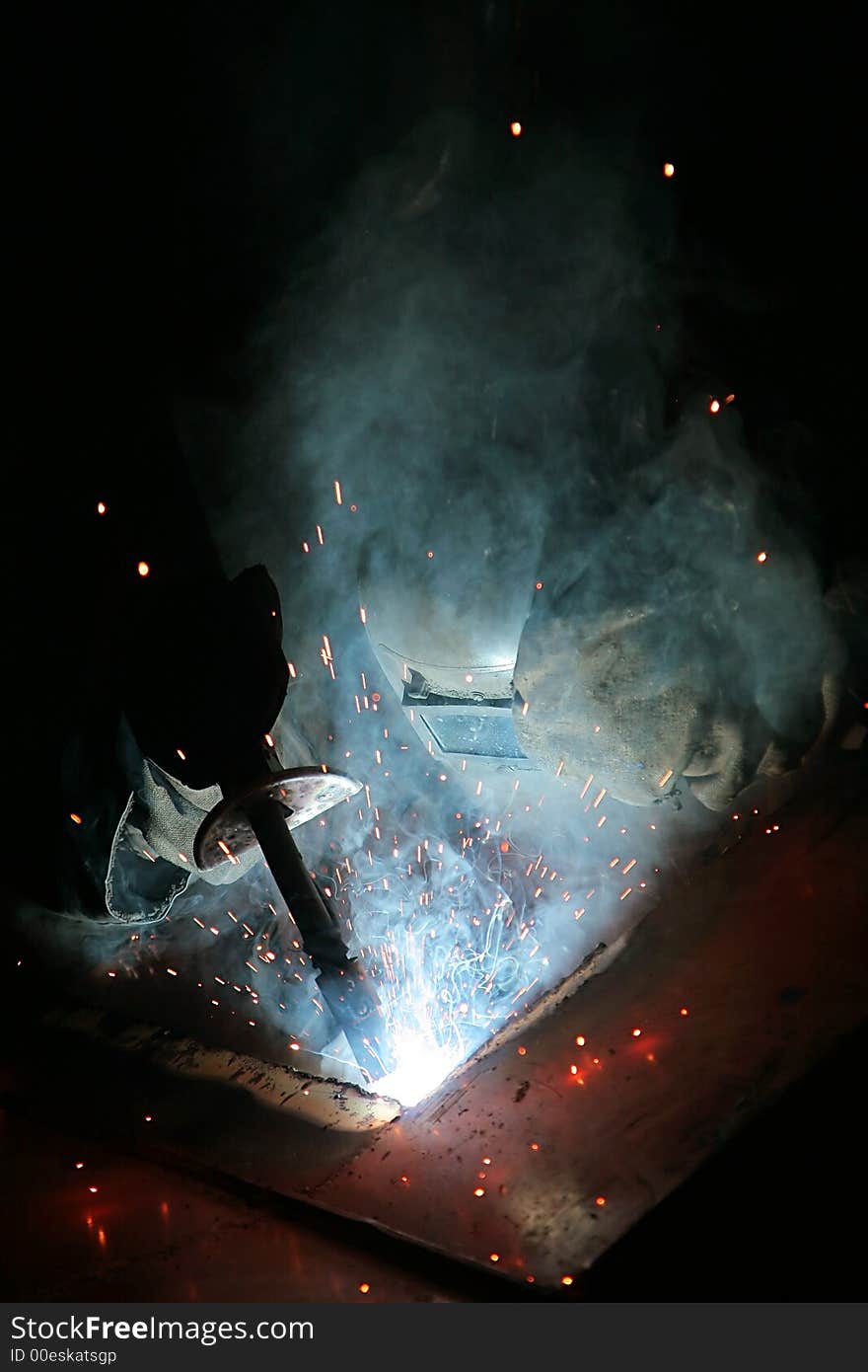 Electric welding of details at a modern factory