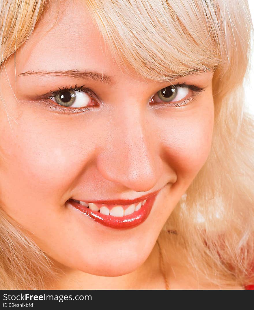 Beautiful young woman face. Close up. Over white background