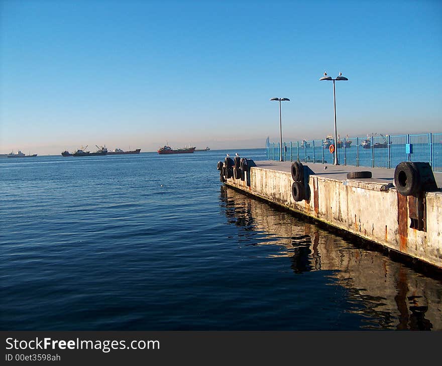 Seagulls are resting on the wharf near the Marmara sea. Seagulls are resting on the wharf near the Marmara sea