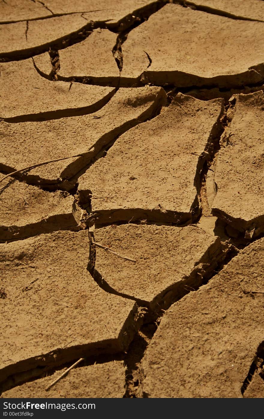 Cracked sand soil, waterless dirt on a deserted ground