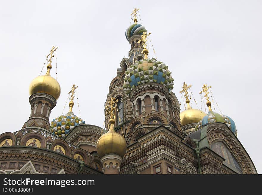 Greater beautiful golden dome with cross