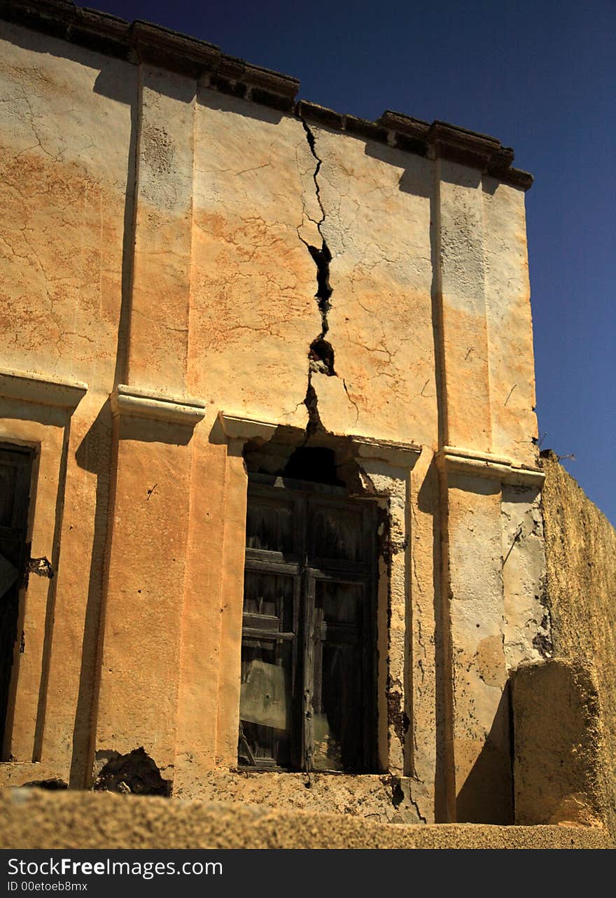 Old ruined and cracked building Santorini Greece