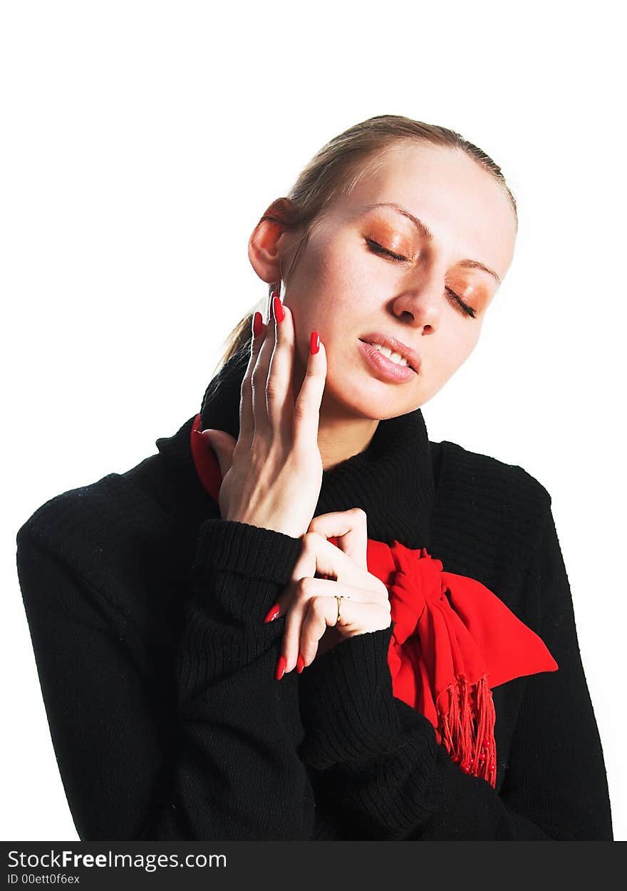 The girl in a red scarf and a black sweater over white. The girl in a red scarf and a black sweater over white