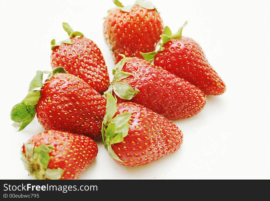 Red strawberry isolated on white