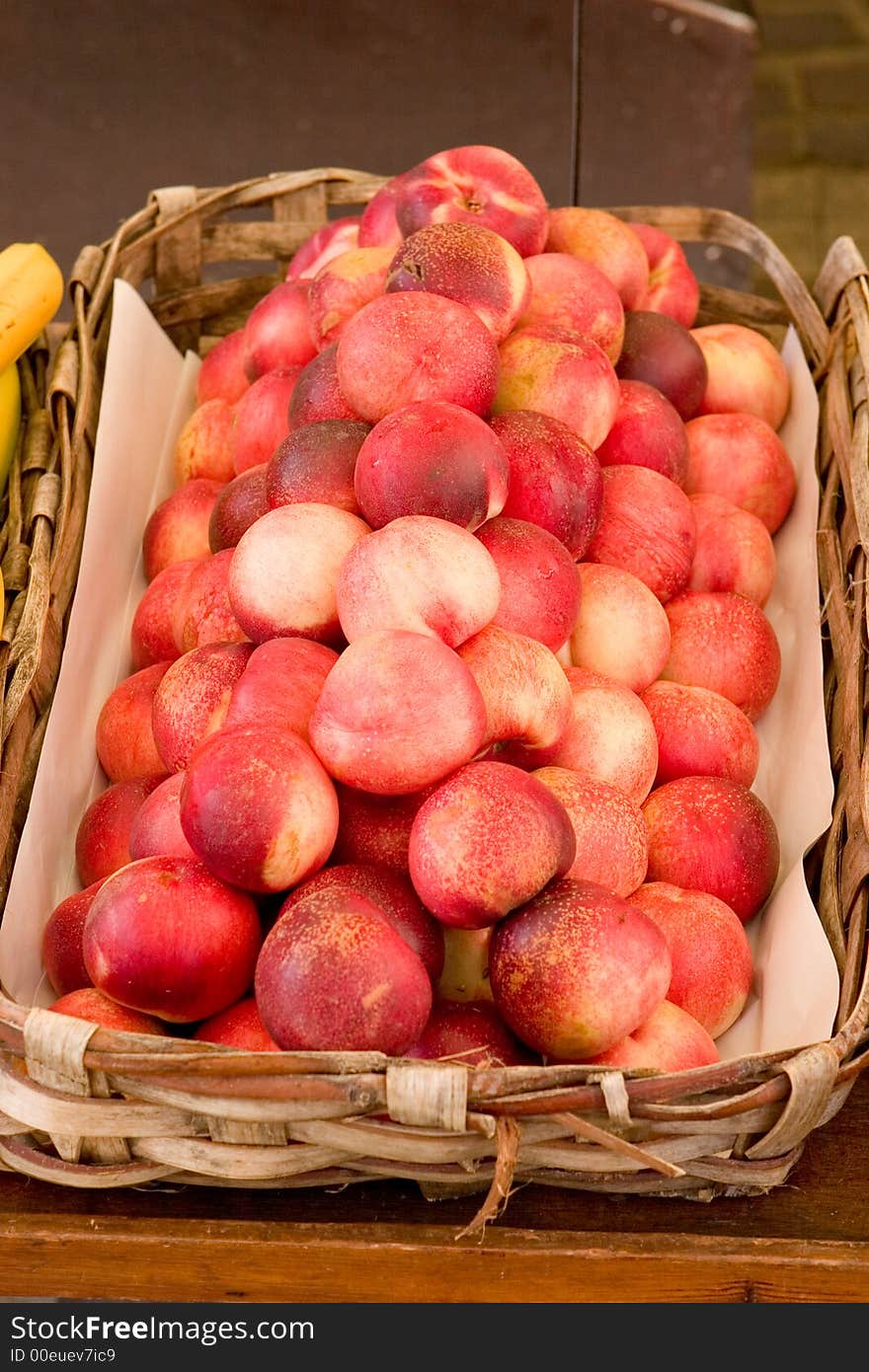 A basket full of fresh peaches