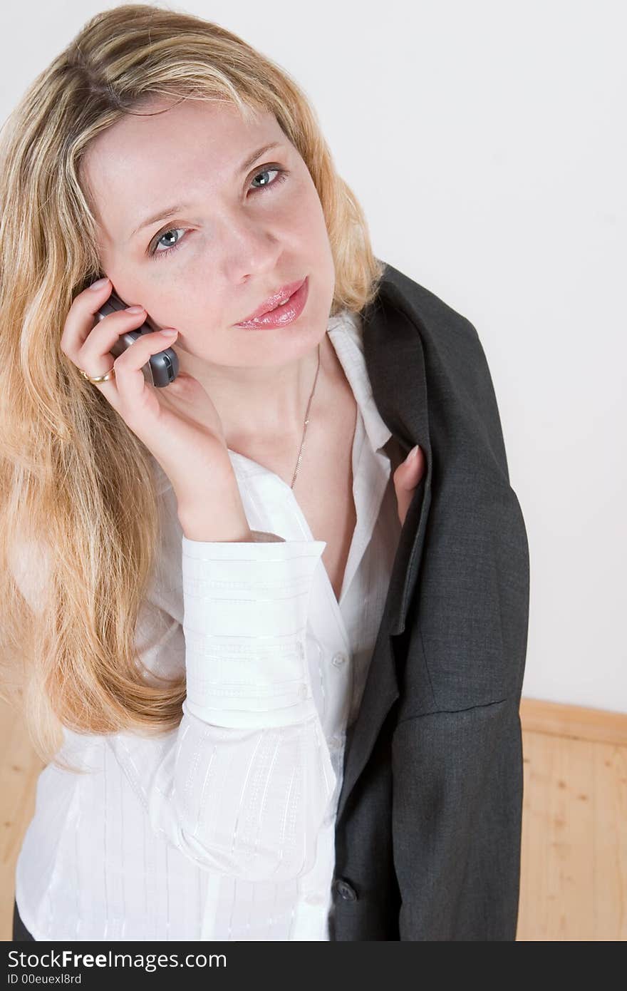 A woman talking on a mobile