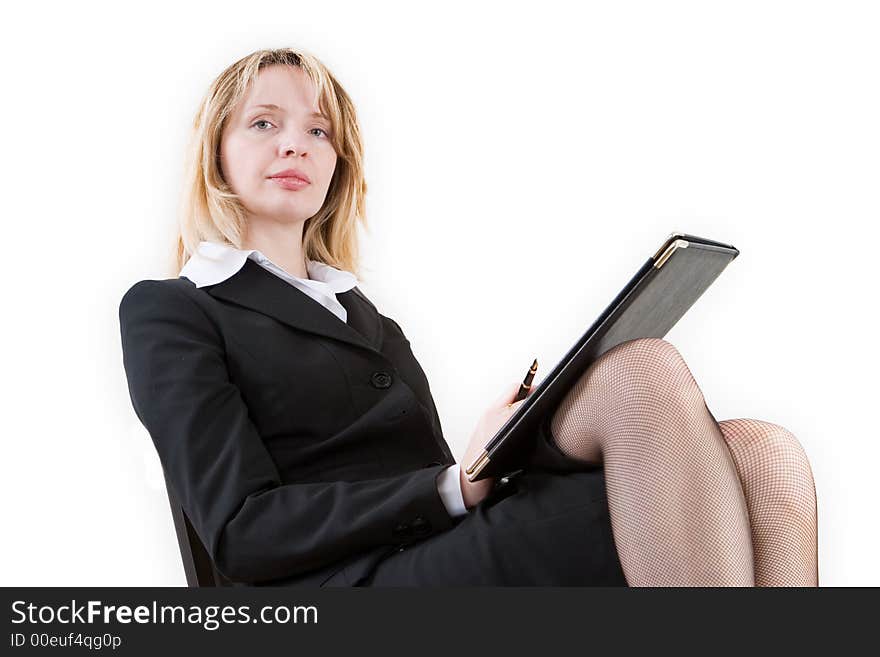 A woman with crossed legs and a black folder. A woman with crossed legs and a black folder