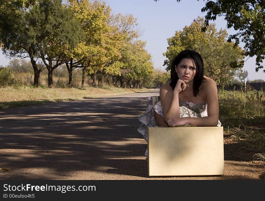 Sad brunette with landscape