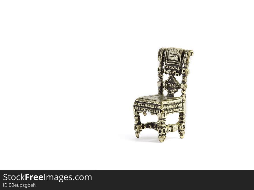 Small chair in metal silver. Object isolated.