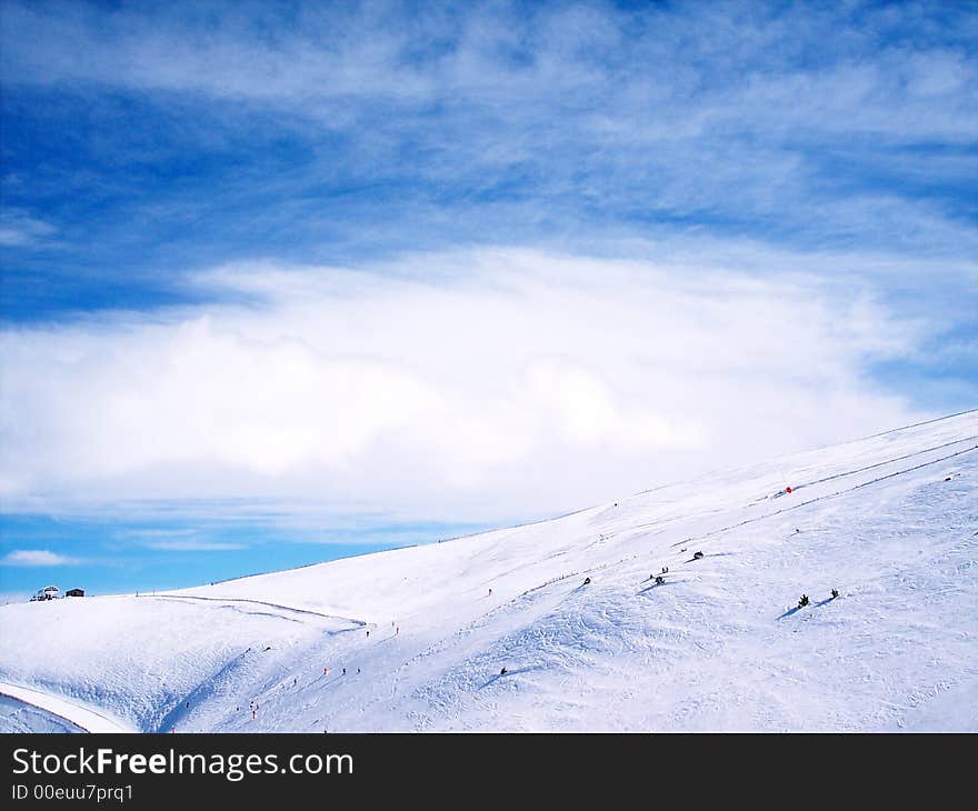 Beautiful declivity of the mountain and blue sky