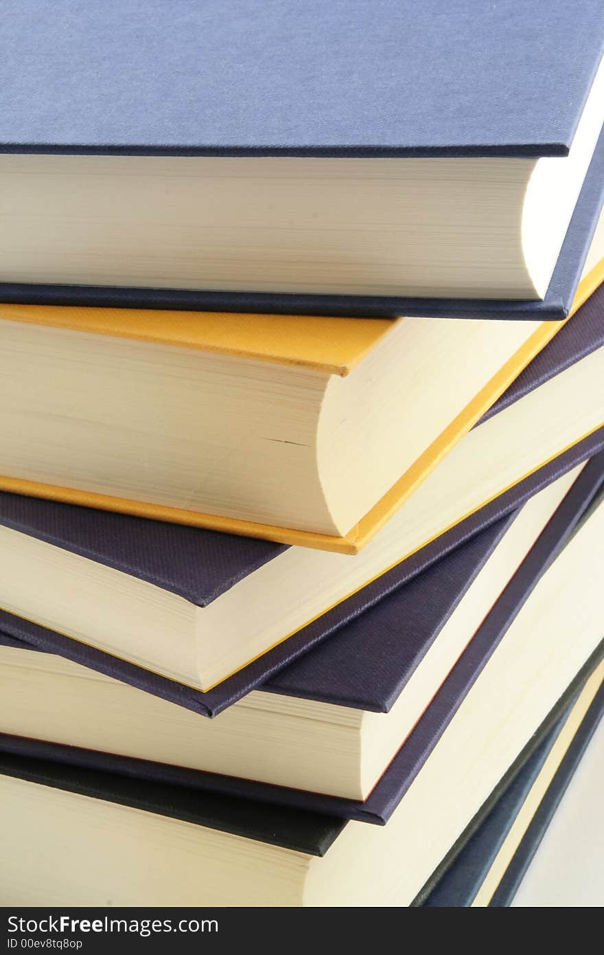 Stack of books against a white background