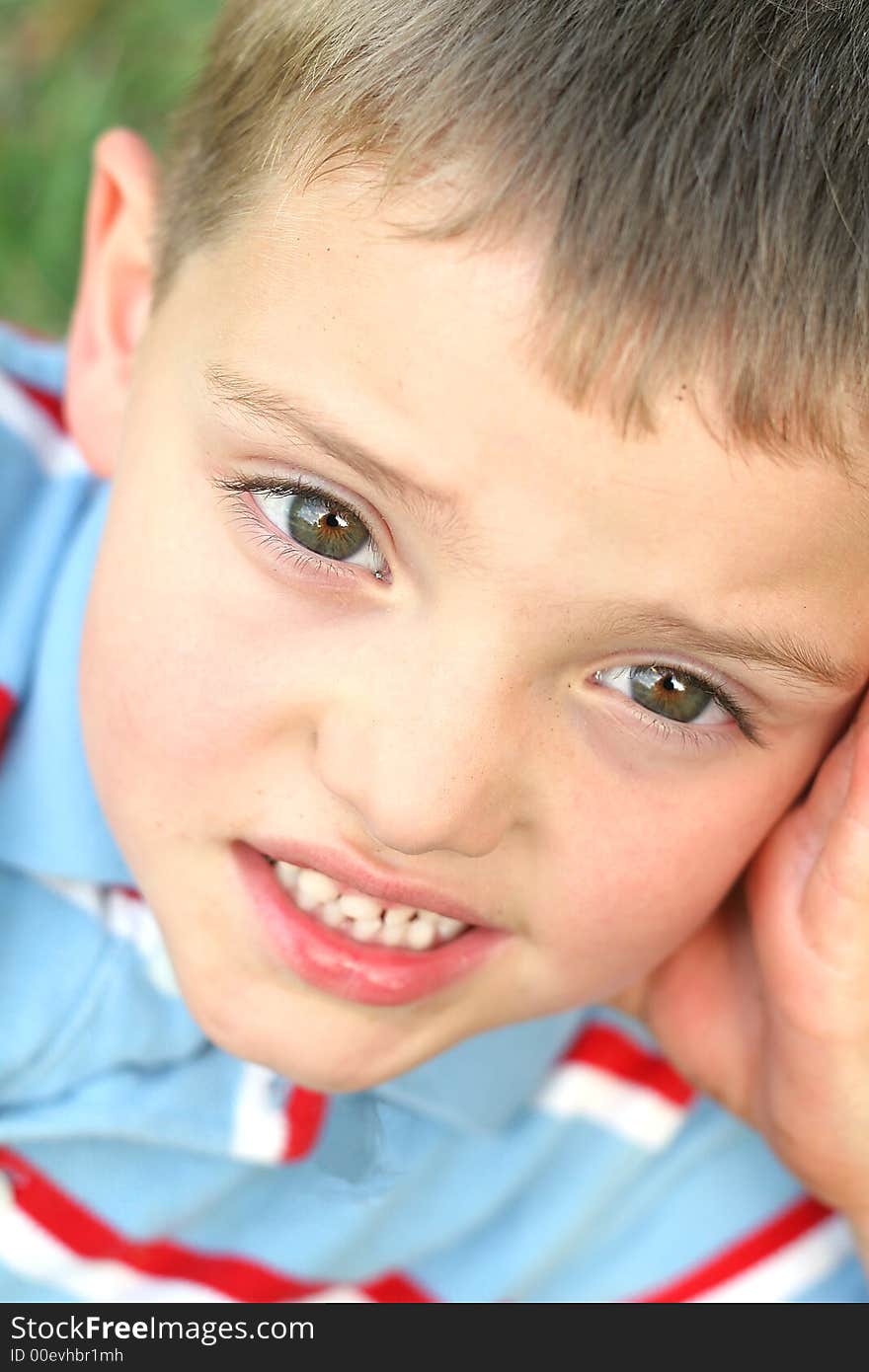 Little Boy In Grass Vertical