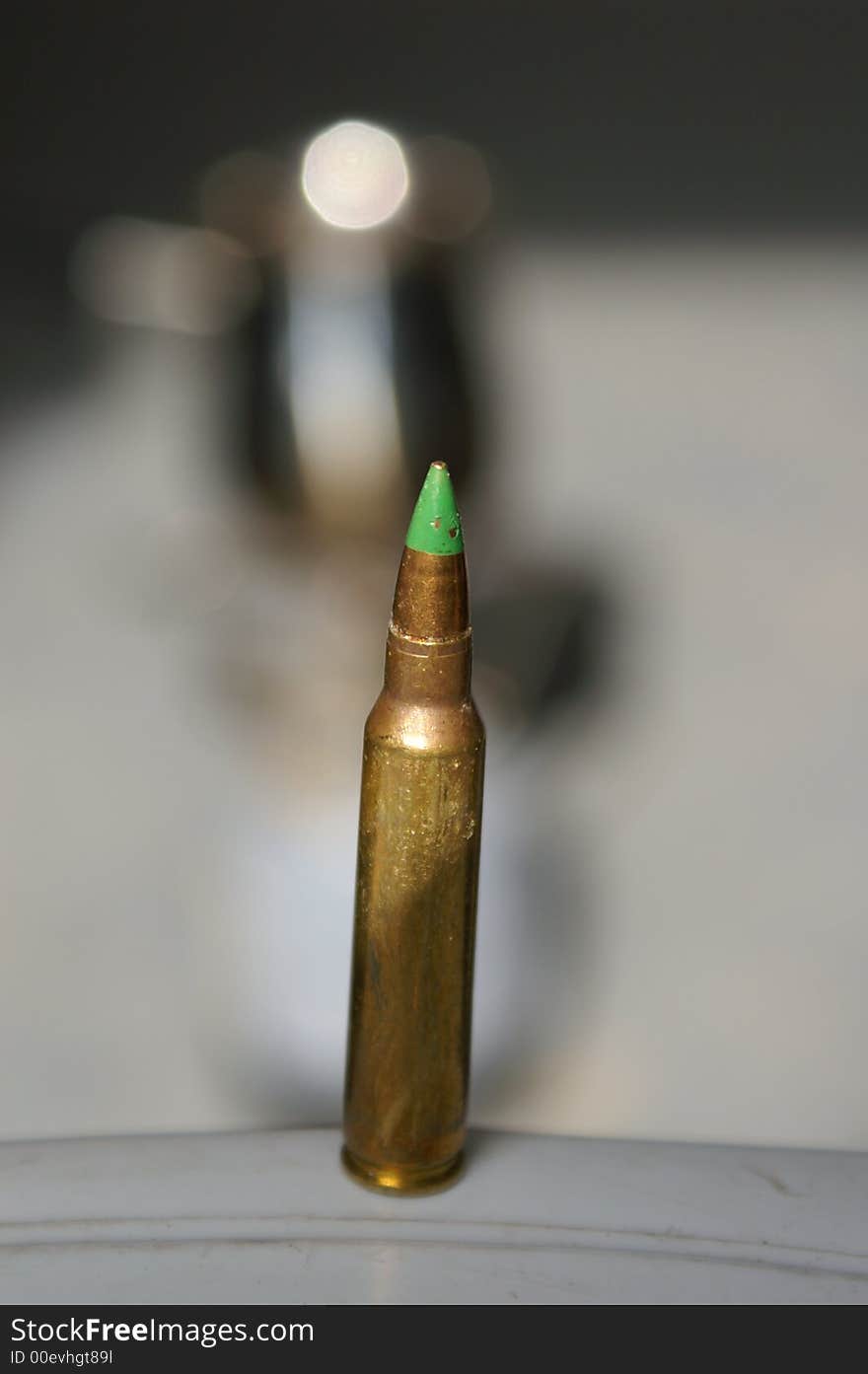 A Bullet On A Table