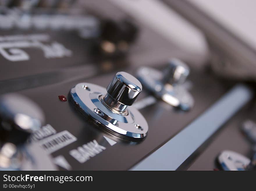 A detailed view of a pedal board for guitar. A detailed view of a pedal board for guitar