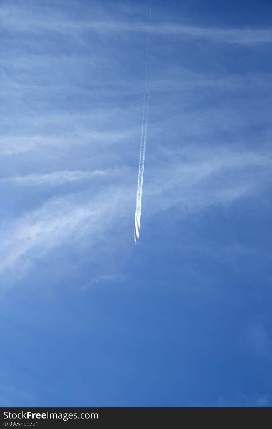 Trace of a jet airplane crossing the sky like a comet. Trace of a jet airplane crossing the sky like a comet.