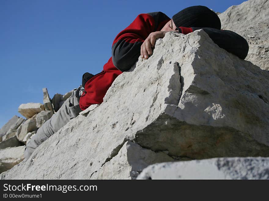 Sleeping man in red blouse and black hat. Sleeping man in red blouse and black hat