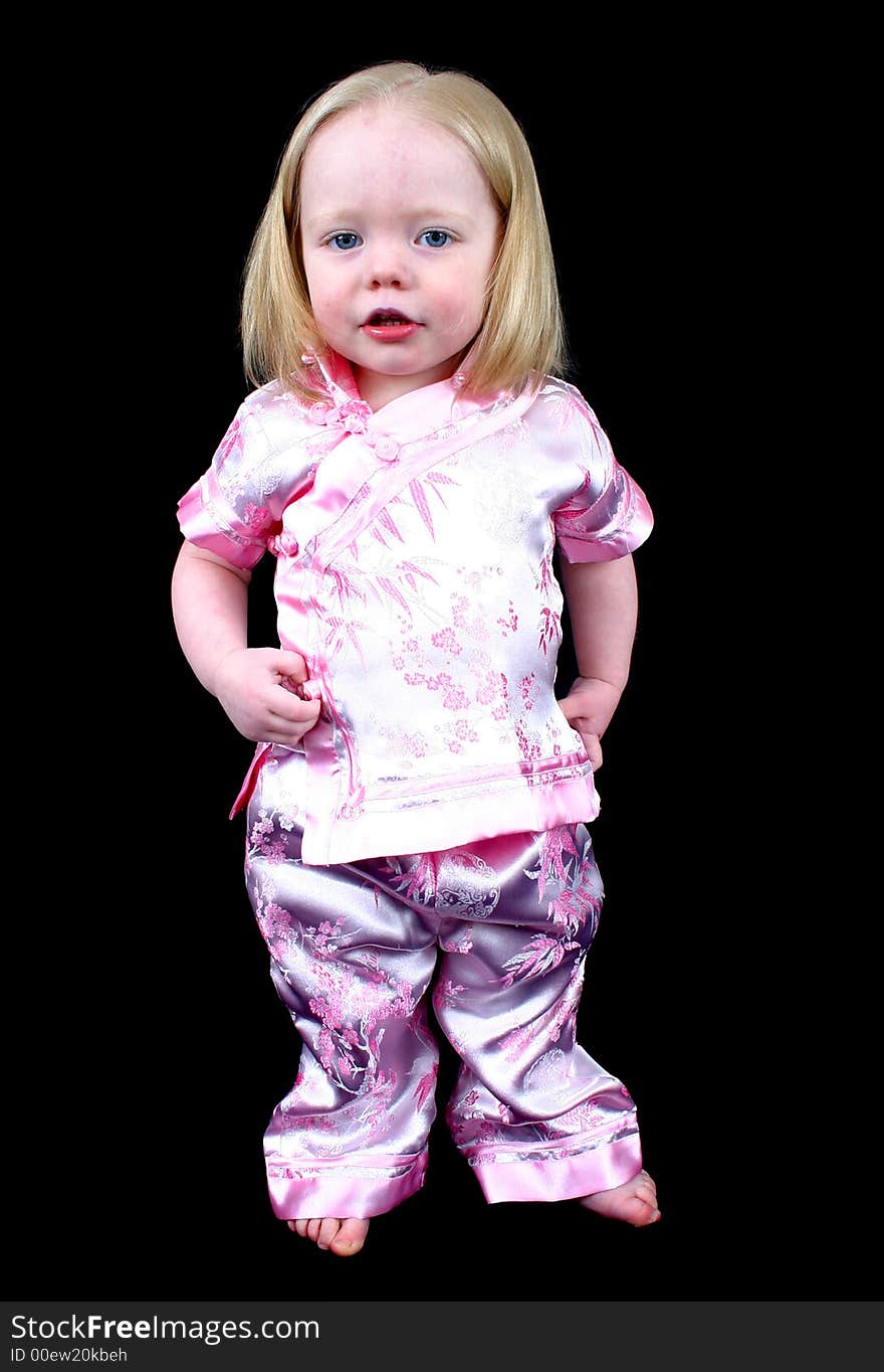 Cute Girl standing on a black background