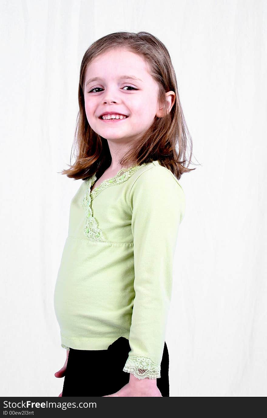 Cute little girl on a white background