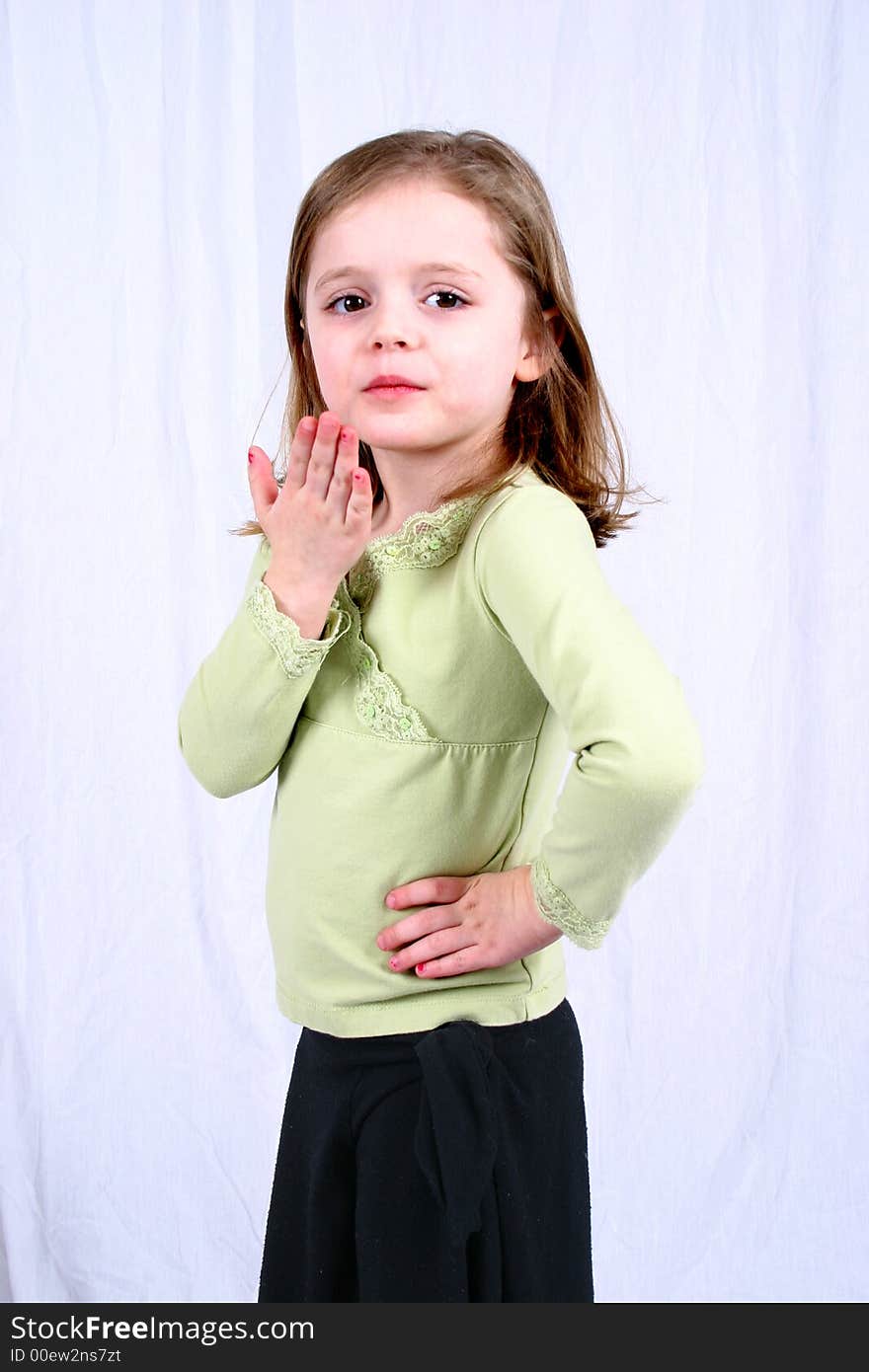 Cute little girl blowing a kiss. Cute little girl blowing a kiss