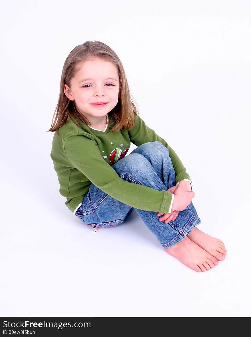 Cute little girl on white