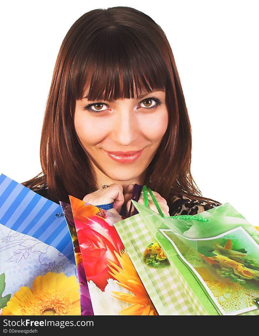 Sexy woman with a bunch of packages isolated over white background. Sexy woman with a bunch of packages isolated over white background