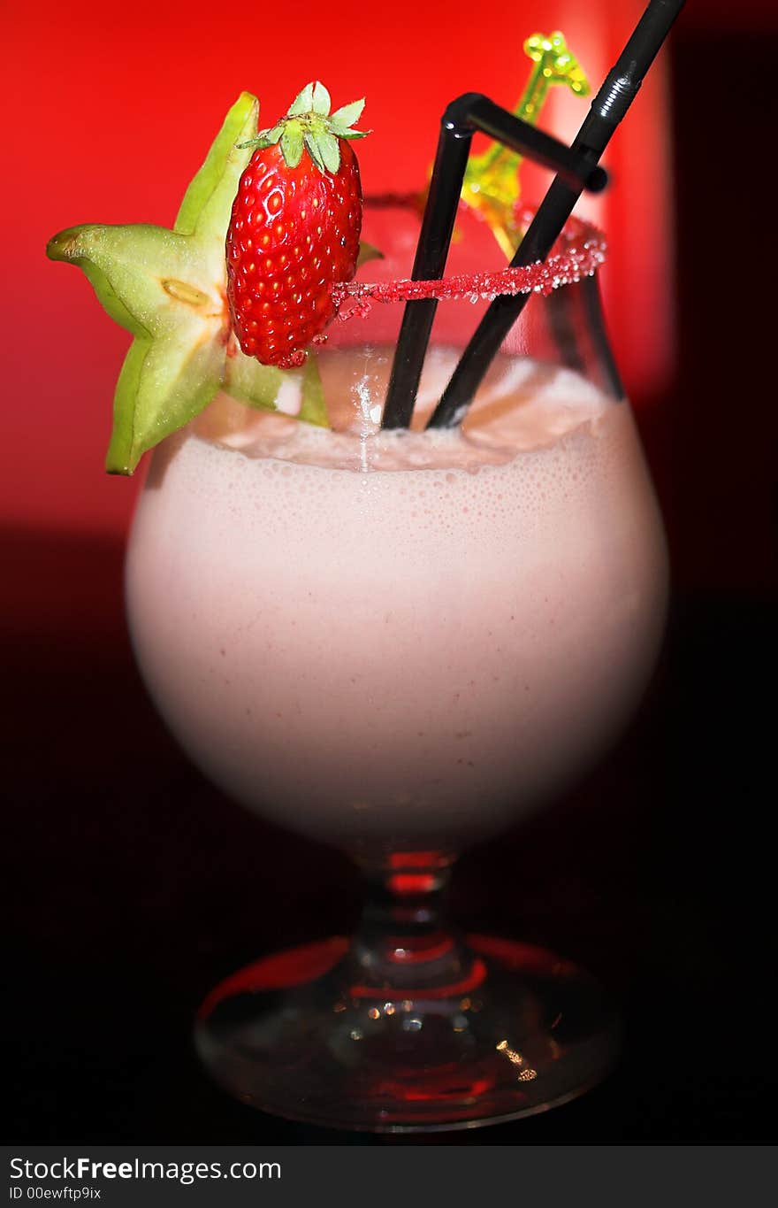 Milkshake with strawberry in glass. Milkshake with strawberry in glass