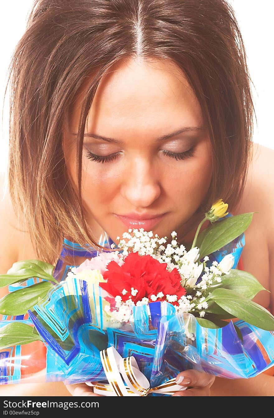 Woman Sniffing Flowers