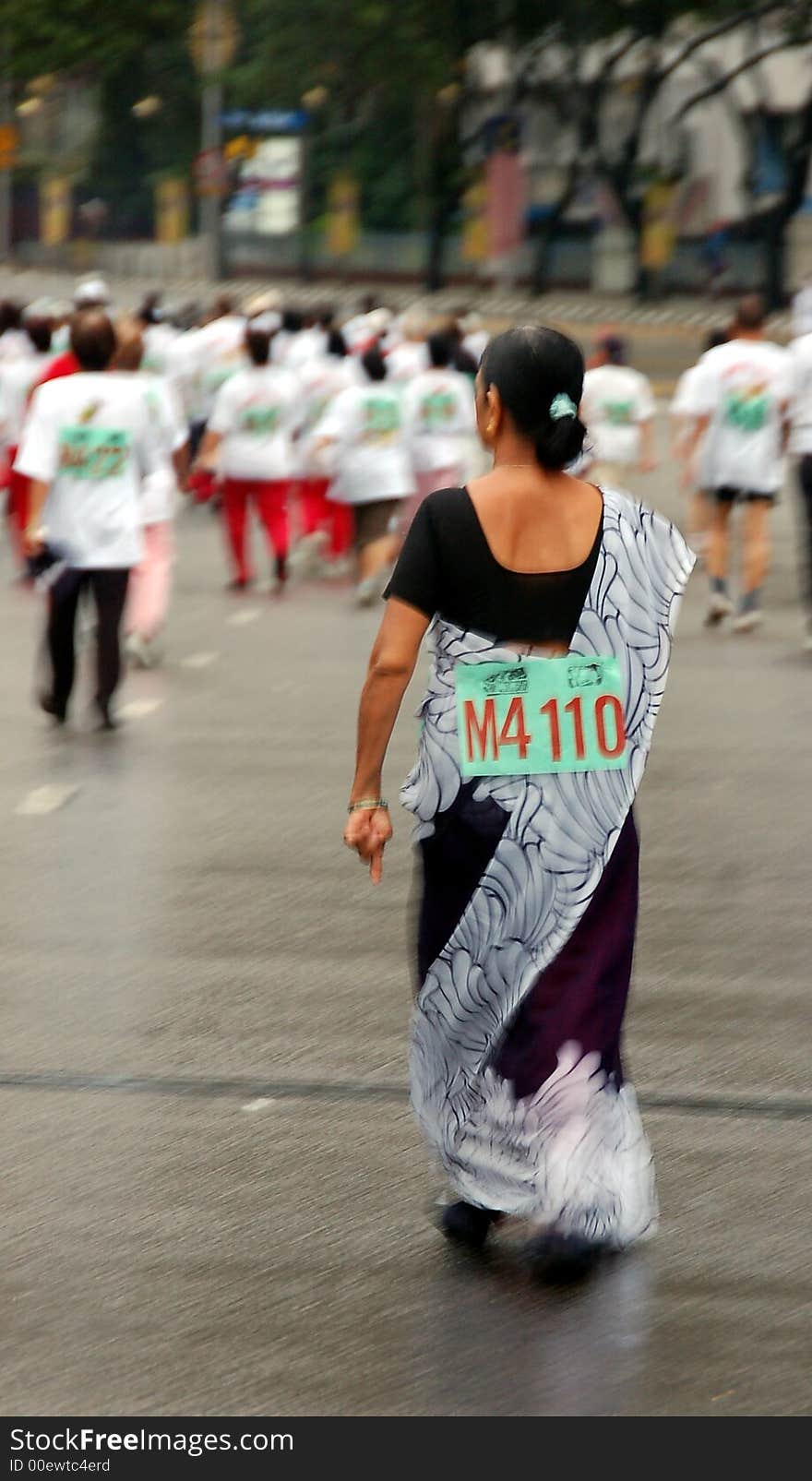 A elderly Indian lady  in a morning competition. A elderly Indian lady  in a morning competition