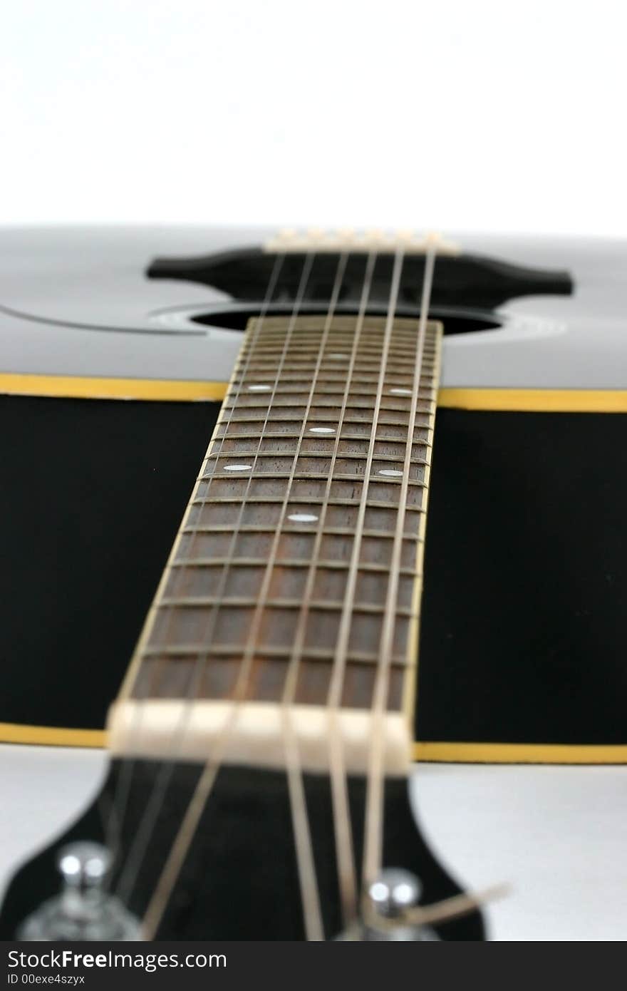 Close up of guitar parts on white background