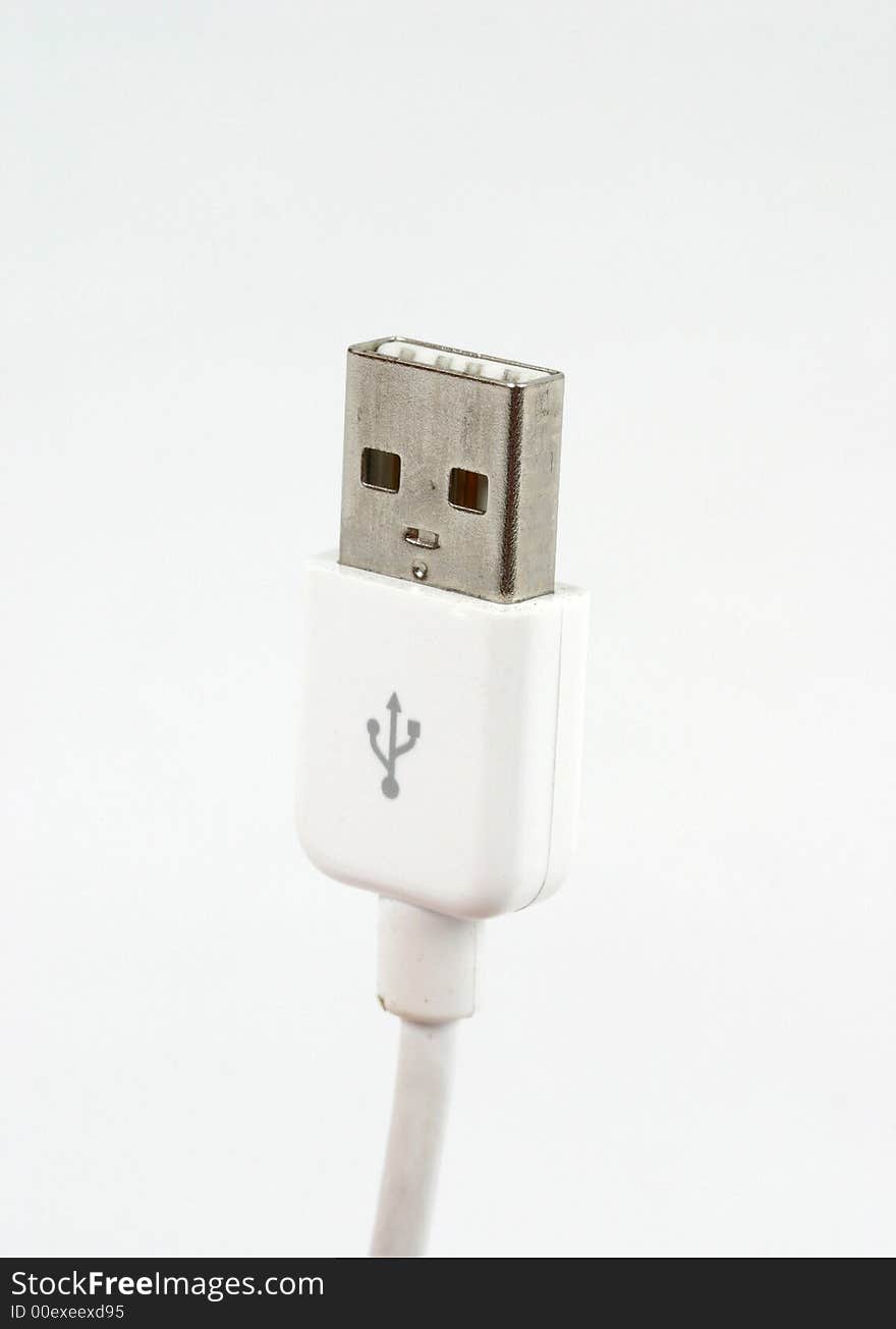 Close up of a USB cable on white background