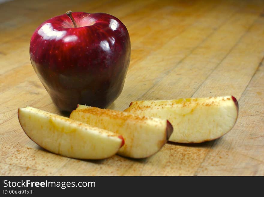 A shiny apple with cinnamon. A shiny apple with cinnamon