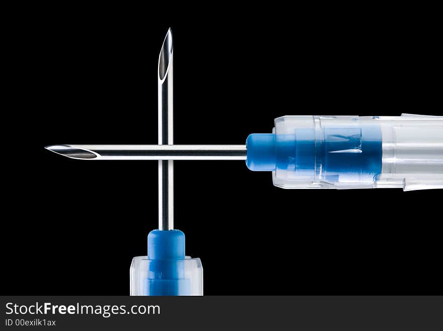 Syringe needles cross