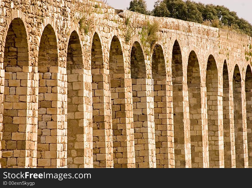 Arches of an ancient Roman aqueduct, Northern Galilee, Israel.