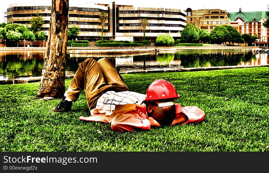 Lunchtime in Africa, man having a snooze during his lunch hour.