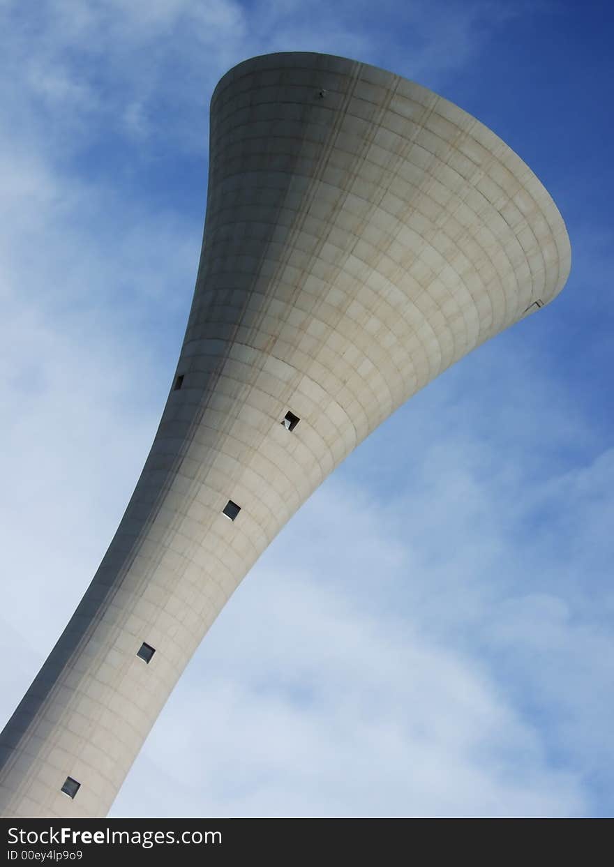 Municipal water tower on the blue sky