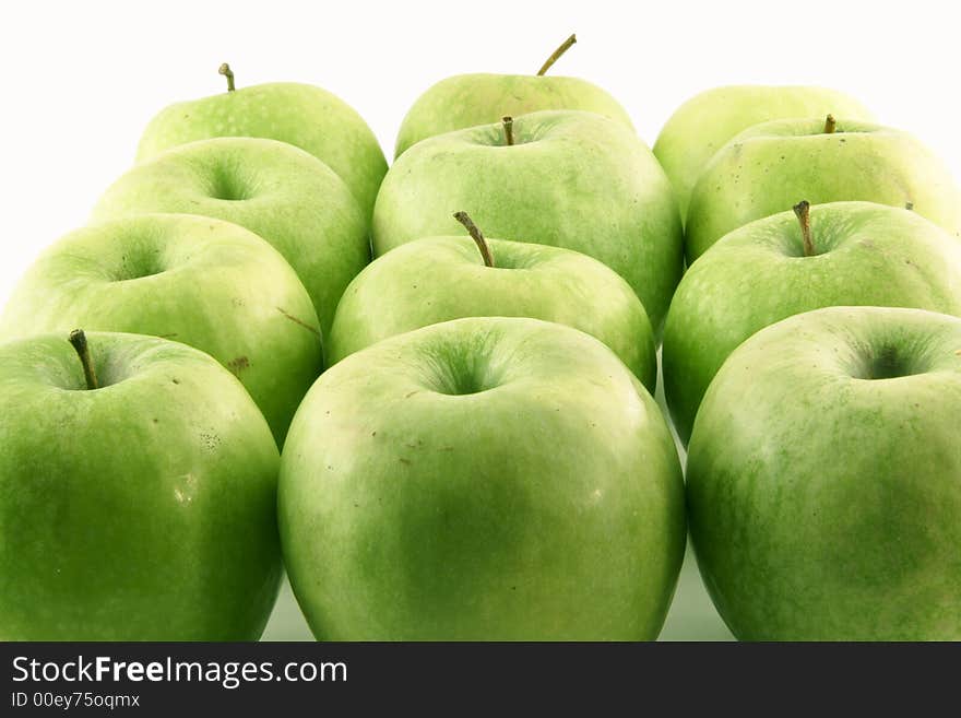 Green apples set on a white background