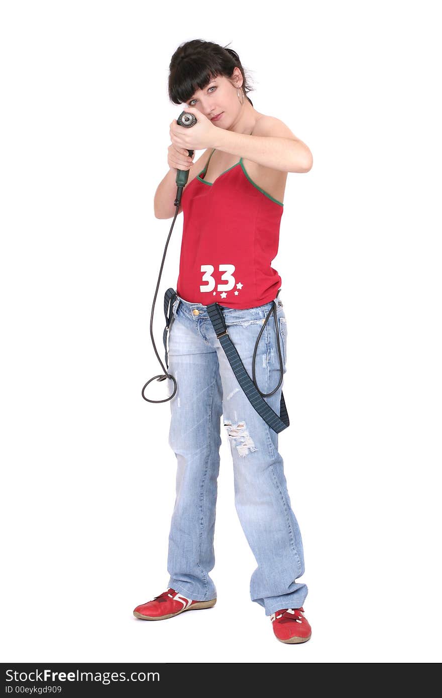 Funny woman standing with a drill. white background. Funny woman standing with a drill. white background