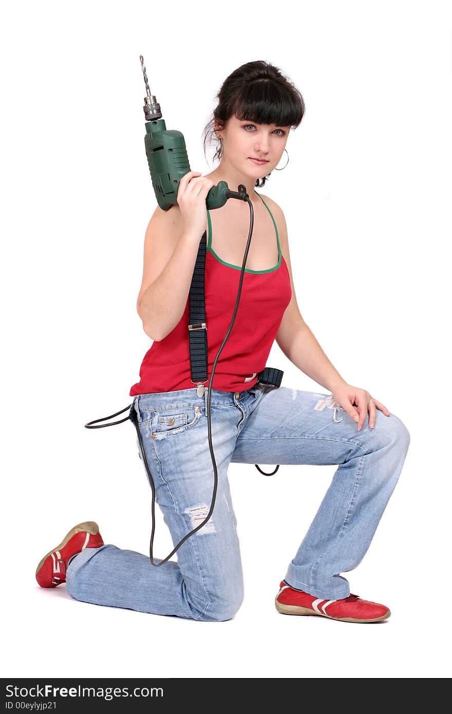 Woman and a drill on white background