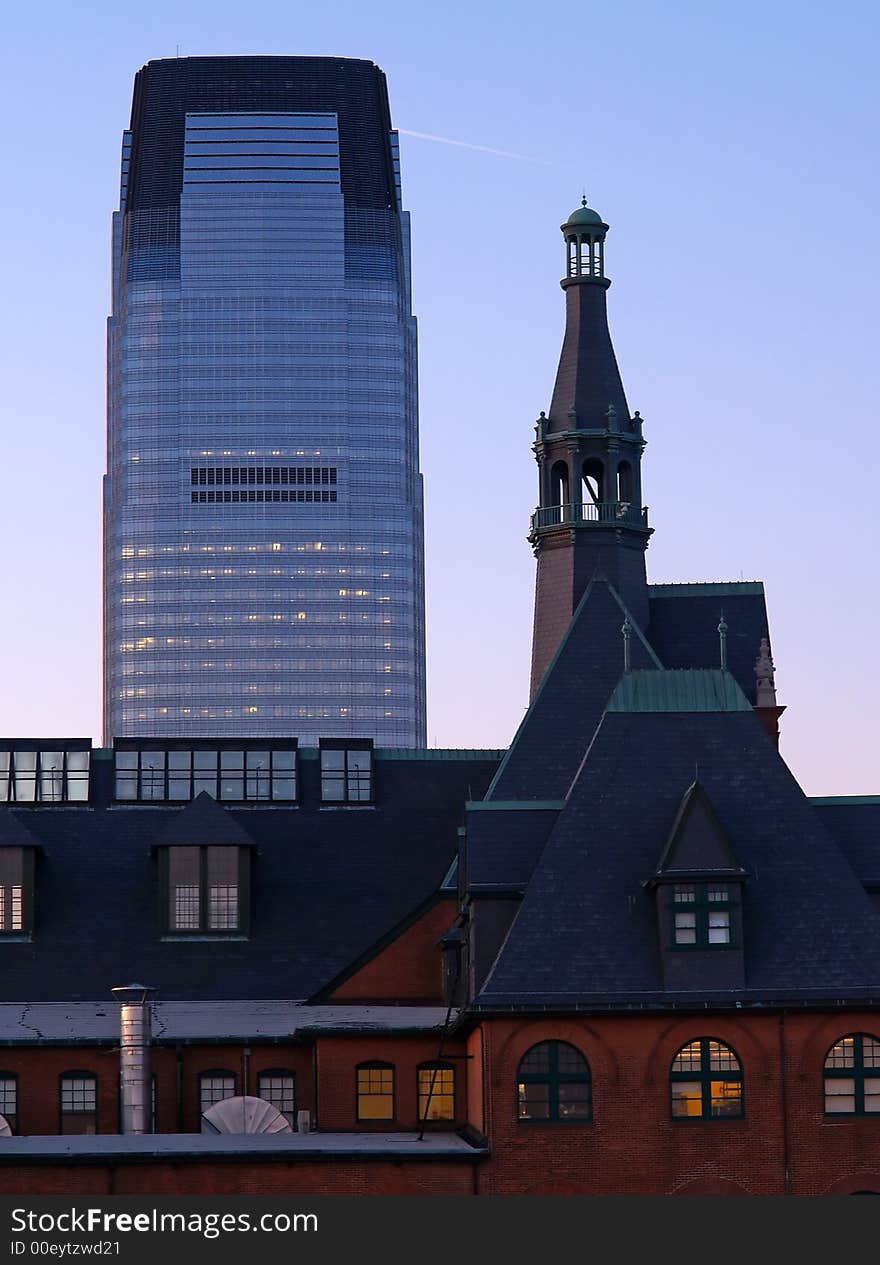 An old train station and a modern high-rise office building in New Jersey. An old train station and a modern high-rise office building in New Jersey