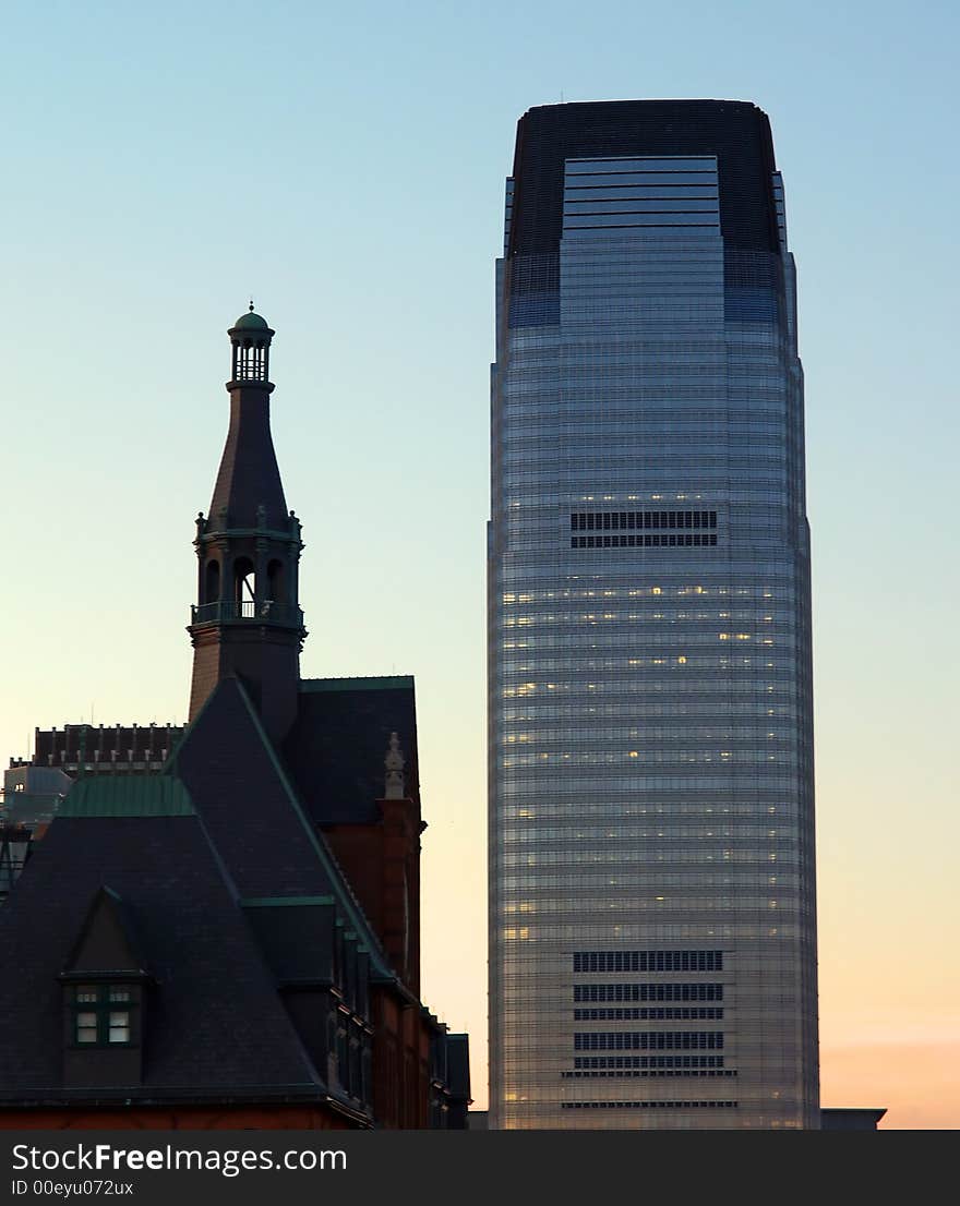 An old train station and a modern high-rise office building in New Jersey. An old train station and a modern high-rise office building in New Jersey