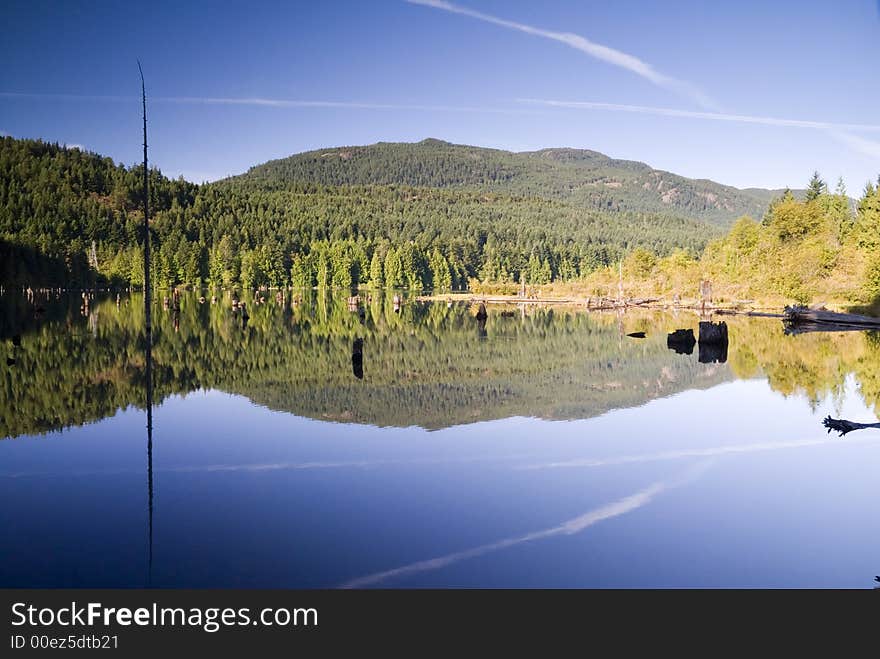 This image is captured at a small lake on vancouver island in canada. This image is captured at a small lake on vancouver island in canada.