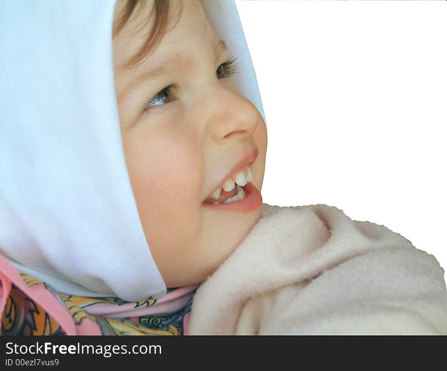 Smiling little girl with head scarf. Smiling little girl with head scarf.