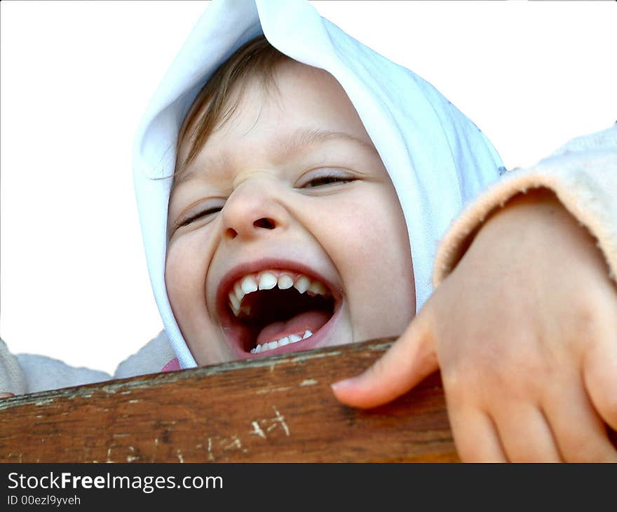 Smiling little girl with head scarf. Smiling little girl with head scarf.