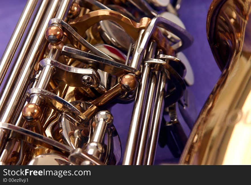 Abstract close up shot of an alto saxophone. Abstract close up shot of an alto saxophone